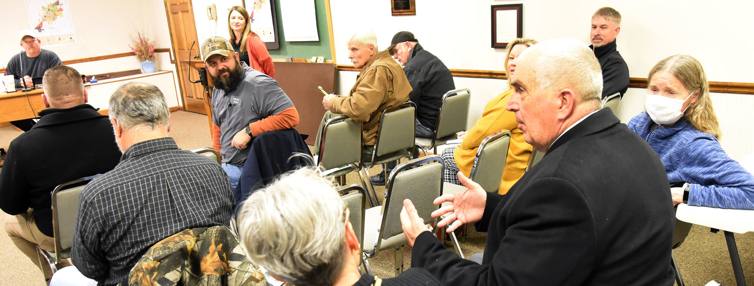 STATE REP. BRUCE SASSMANN (right) comments Jan. 20 on possible funding options for development of the Rock Island Trail through communities in the 62nd House District he represents during a meeting at Owensville City Hall.