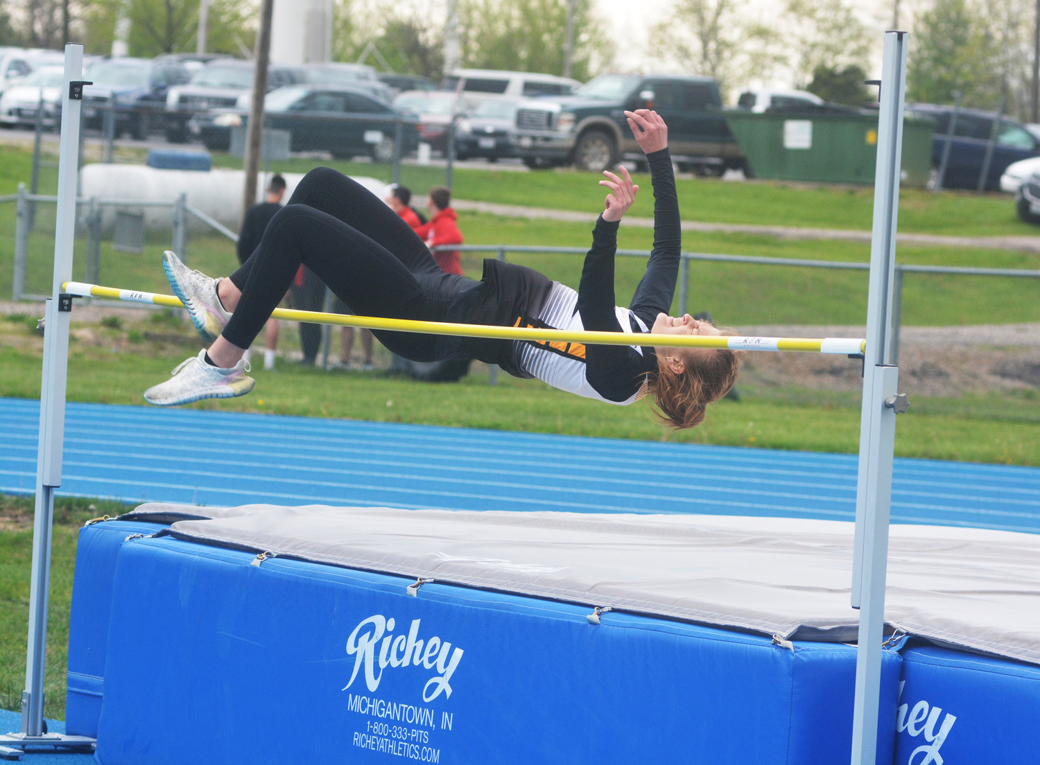 Claudia Wieberg contorts her body over the high jump bar during the Gasconade Valley Conference (GVC) Track Meet Saturday in Bourbon for Vienna’s Lady Eagles.
