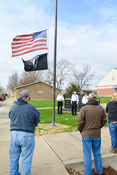 Belle Veterans of Foreign Wars Post 3410 led by Post Commander Oral Seymour, Sgt. Diane James and Sgt. Dennis Ridenhour conducted the flag ceremony at the four-way stop located between Alverado Avenue  and Third Street Friday morning. The community was invited to attend the ceremony.